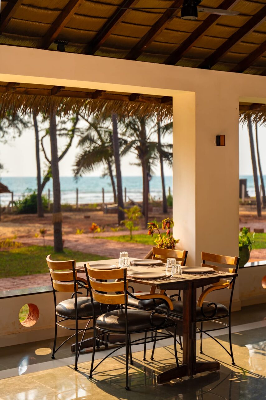 Outdoor dining area overlooking the beach at Miraya by the Beach